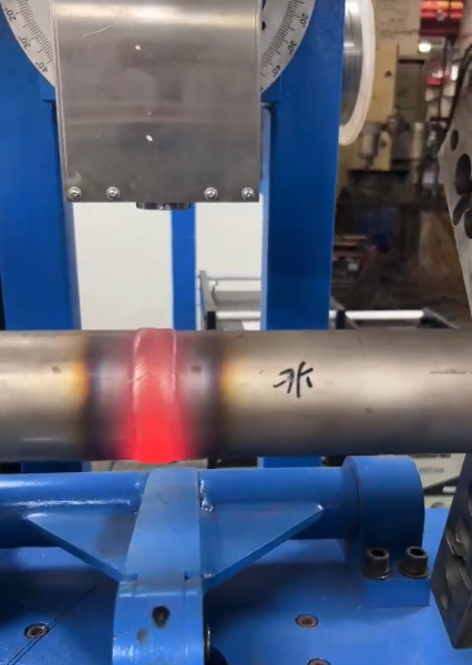 Closed tube-to-tube welding machine operation on a boiler tubesheet